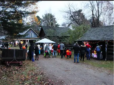 people outside Pioneer Village for Halloween