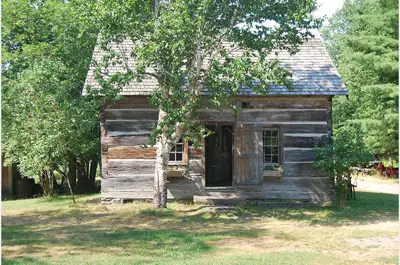 exterior log home titled Daniel Bray House