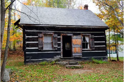 exterior image of log home titled Hares House